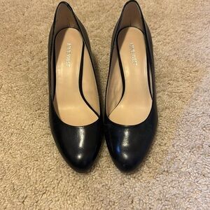 Nine West classic black wedge heels
Size 7